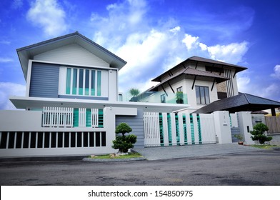 Luxury family house against blue sky.