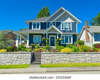 Luxury Family House With Landscaping And Blue Sky Background. Canada. Family House On The Terrace Land.