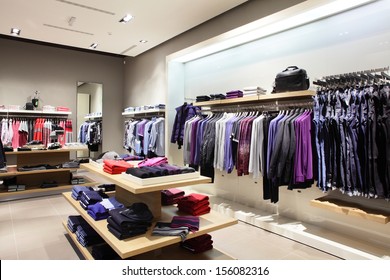 luxury and fashionable european different clothes shop - Shutterstock ID 156082316