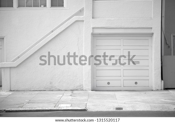 Luxury grey garage\
door of a detached house\
