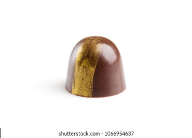 Luxury Handmade Chocolate Candy Decorated With Golden Paint Isolated On White Background. Exclusive Handcrafted Bonbon. Product Concept For Chocolatier 