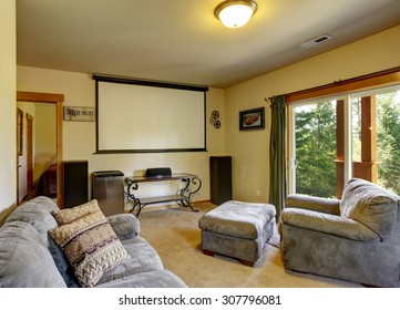 Luxury Home Theater In Cabin Style Home With Carpet.