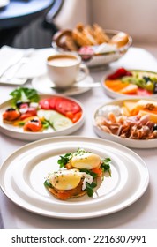 Luxury hotel and five star room service, various food platters, bread and coffee as in-room breakfast for travel and hospitality brand