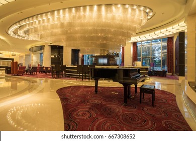 Luxury Hotel Lobby With Modern Crystal Ceiling Lamp.