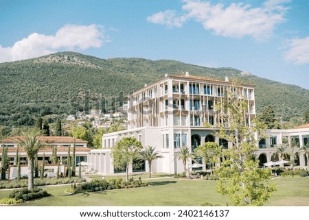 Luxury hotel One and Only among a green garden at the foot of the mountains. Portonovi, Montenegro