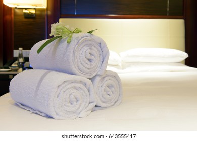 Luxury Hotel Towels On Bed Ready To Be Used By Guest