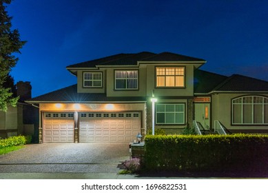 Luxury House At Night In Vancouver, Canada.