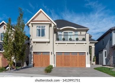 Luxury House At Sunny Day In Calgary, Canada.