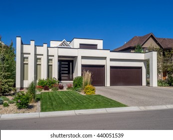 Luxury House At Sunny Day In Calgary, Canada.