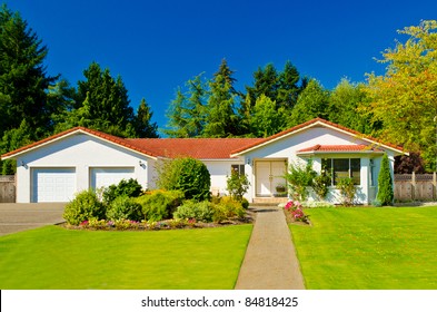 Luxury House At Sunny Day In Vancouver, Canada.