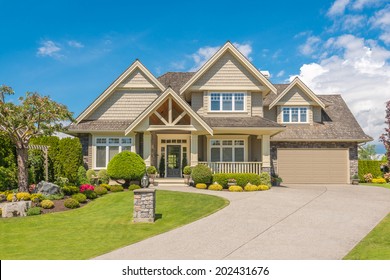 Luxury House In Vancouver, Canada Against Blue Sky