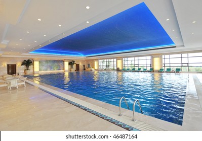 Luxury indoor swimming pool with beautiful clean blue water.