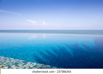 Luxury Infinity Swimming Pool With Blue Sky