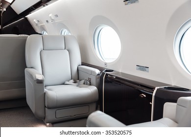 Luxury interior in bright colors of genuine leather in the business jet