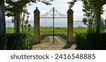 Luxury iron gate to the entrance of a vineyard near St-Emilion, France