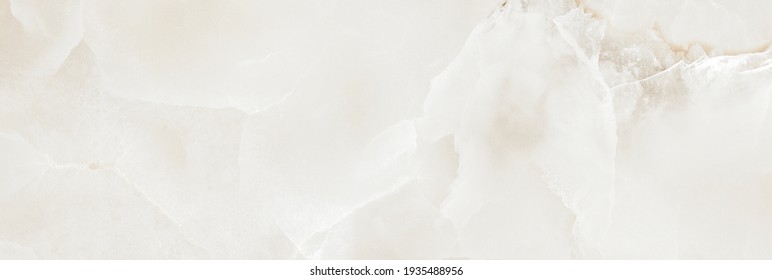Luxury ivory onyx marble texture background, liquid paints cloudy effect, panoramic marbling texture design for ceramic tile, banner, wallpaper, website, packaging design and décor home tile.