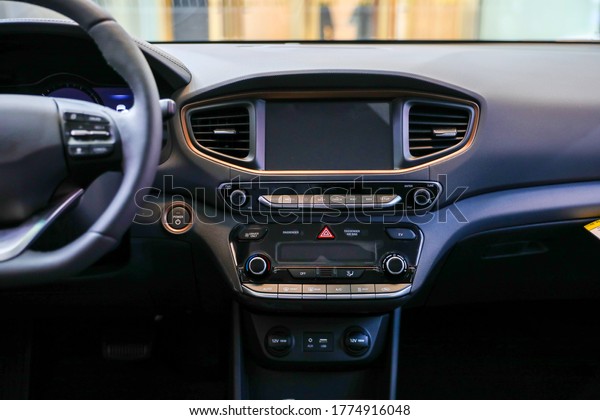 Luxury korean car interior dashboard with wide\
screen and functional\
button