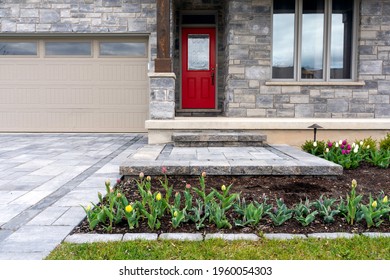 Luxury Landscaping Of Paver Driveway, Landing, And Steps With Matching Pattern Detail And Front Garden.