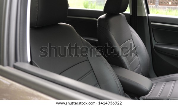 luxury leather seats in the car. Black leather seat\
covers in car. beautiful leather car interior design. stylish\
leather seats in the\
car.