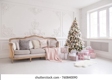 Luxury Living Room Interior With Sofa Decorated Chic Christmas Tree, Gifts, Plaid And Pillows.