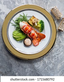 Luxury Lobster Tail On A Gold Plate