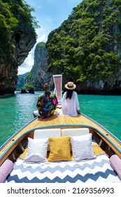 Luxury Longtail Boat In Krabi Thailand, Couple Man, And Woman On A Trip At The Tropical Island 4 Island Trip In Krabi Thailand. Asian Woman And European Man Mid Age On Vacation In Thailand. 