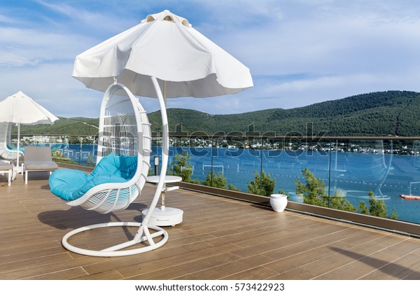 Luxury Lounge Swing Chair Umbrella Beautiful Stock Photo