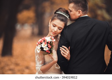 Luxury Married Wedding Couple, Bride And Groom Posing In Park Autumn