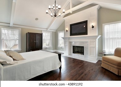 Luxury Master Bedroom With Fireplace