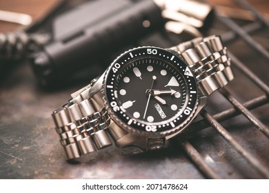 Luxury men wrist watch with black dial and stainless steel watch band. - Shutterstock ID 2071478624