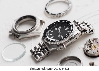 Luxury Men Wrist Watch With Watch Parts Over White Background. Repairing Wrist Watch Concept.