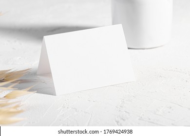 Luxury Mockup Template, Empty Stationery Card With Dry Plants Flower And Perfume On A White Background And Design Element For Wedding Invitation, Rsvp, Thank You Card, Greeting, Business Card