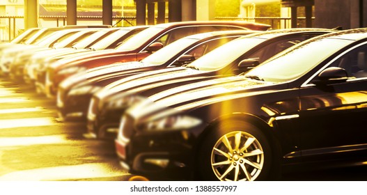 Luxury Modern Cars For Sale Stock Lot Row. Car Dealer Inventory. Cars For Sale Stock Lot Row. Car Dealer Inventory. Sunset Sun Rays Light. Sun Beam