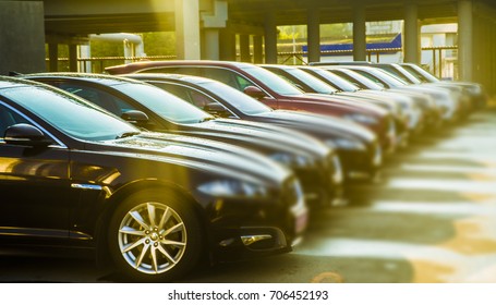 Luxury Modern Cars For Sale Stock Lot Row. Car Dealer Inventory. Cars For Sale Stock Lot Row. Car Dealer Inventory. Sunset Sun Rays Light. Sun Beam