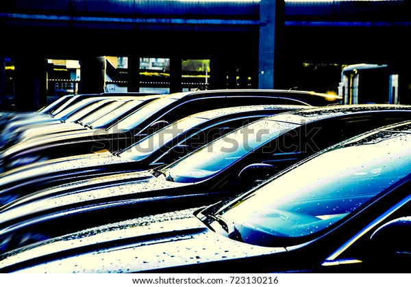luxury modern Cars For Sale Stock Lot Row. Car\
Dealer Inventory. Cars For Sale Stock Lot Row. Car Dealer\
Inventory. sunset sun rays light. sun\
beam