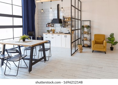 luxury modern design of a cozy small Scandinavian-style studio apartment with white walls, second floor with a library and huge high window full of day light