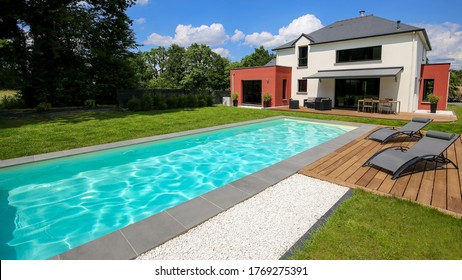 luxury and modern property with a swimming pool - Shutterstock ID 1769275391