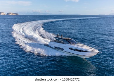 luxury motor yacht in navigation, aerial view - Shutterstock ID 1558426772