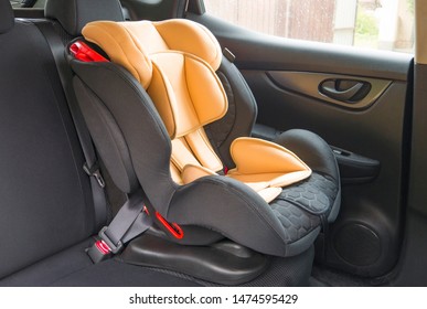 Luxury New Safety Car Seat For Baby In A Interior. 