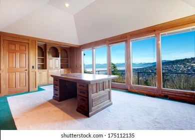 Luxury Office Room With Rich Wood Furniture, Carpet Floor, Cathedral Ceiling And Amazing Floor-to-ceiling Window With Impressive View On Mountain Landscape