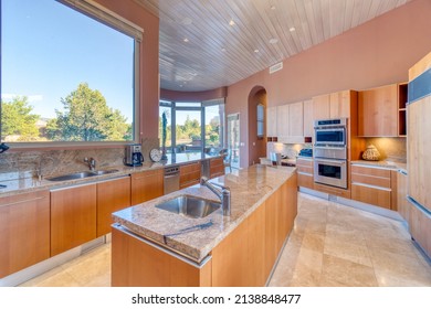 A luxury orange kitchen in arizona - Shutterstock ID 2138848477