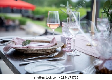 Luxury Outdoor Table Setting With Rosé In Wine Glass.