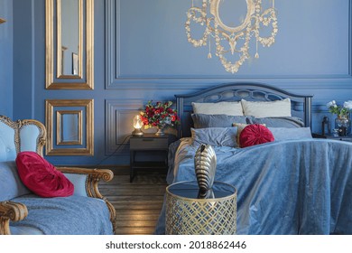 Luxury Posh Bed Room Interior In
Deep Blue Color With Antique Expensive Furniture And Gold Elements In Baroque Style
