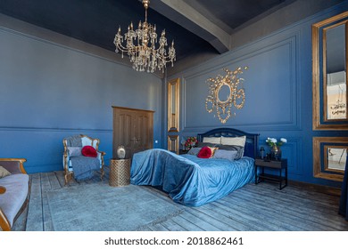 Luxury Posh Bed Room Interior Indeep Blue Color With Antique Expensive Furniture And Gold Elements In Baroque Style