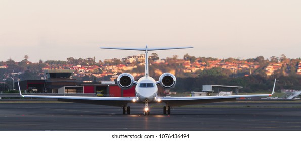 Luxury Private Jet In Front View In Runway