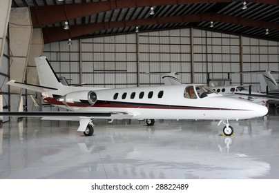 Luxury Private Jet Parked In A Hangar