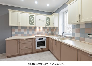Luxury provence styled modern grey, pink and cream colored kitchen interior - Shutterstock ID 1545066023