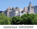 luxury residential buildings surrounding Central Park in New York City