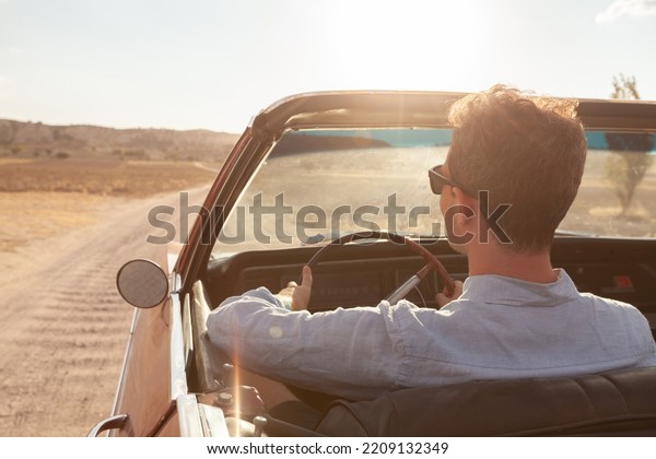luxury, rich man driving cabriolet sport\
vintage car, luxurious\
lifestyle