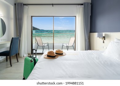 Luxury sea view hotel room with baggage, Travel concept